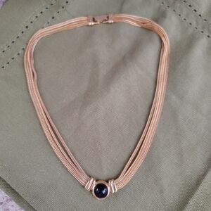 Elegant Gold Necklace with Black Accent